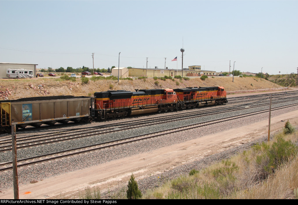 BNSF 6153 and 9047 on the point of a train